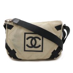 Used Chanel Chanel Sport Line Coco Mark Shoulder Bag Canvas Beige Black (Sku: Gzl14ve7) === General === Brand : Chanel Line : Sport === Design === Type : Shoulder Bag Material : Canvas Color : Beige, Black Outer Pocket : Zipper Pocket Gender : Women === Size === Size (Hxwxd) : 22.5cm X 29cm X 12cm / 8.85'' X 11.41'' X 4.72'' Strap Length : 130cm / 51.18'' === Included Items === Accessories : Box Accessories Notice : Before Purchasing, Please Refer To The Images Of The Accessories Included With T Chanel Sport, Sport Design, Chanel Chanel, Canvas Messenger Bag, Box Accessories, Stylish Shoulder Bag, Accessories Box, Bag Canvas, Sports Design