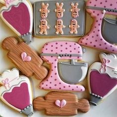 decorated cookies are arranged on a plate to look like they have been made in the shape of kitchen appliances