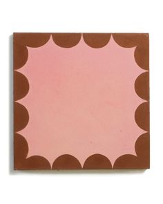 a pink and brown square with scalloped edges