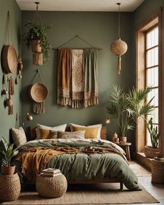 a bedroom with green walls and hanging plants