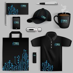 a black and blue shirt, hat, cell phone, pen, wallet, pens and other items on a gray background