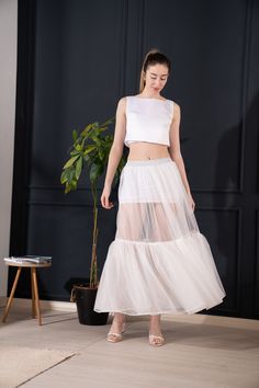 Tulle Skirt ,  Handmade with high-quality tulle fabric for a soft, ethereal feel and graceful movement.Crafted from premium-quality tulle fabric, ensuring durability and a beautiful, flowing drape.Whether you're twirling on the dance floor, strolling through the city streets, or simply want to feel like a princess for a day, our skirt is sure to make you look and feel beautiful. Care Instructions: Mashine Washable at 30oC If you have any questions or special requests, feel free to contact us. Th White Tulle Skirt, Shiny Dress, Skirt Tulle, Graceful Movement, Shiny Dresses, White Dress Party, Feel Like A Princess, White Tulle, On The Dance Floor