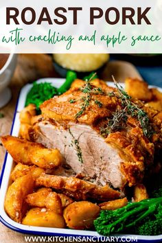 roast pork with crockling and apple sauce on a plate next to broccoli