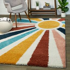 a colorful area rug in a living room