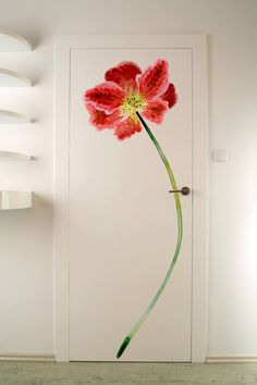 a door with a flower painted on it