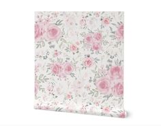 a pink flowered wallpaper with roses on it