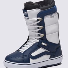 a pair of blue and white snowboard boots