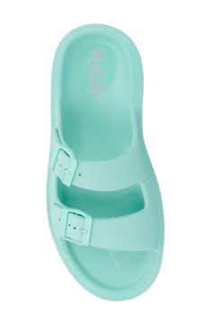 With a cushy insole, this casual slide sandal offers lasting comfort to be a weekend wardrobe favorite. 4 1/2" heel Synthetic upper and lining/rubber sole Imported Casual Green Slides With Removable Insole, Casual Jelly Sandals With Rubber Sole, Casual Green Closed Toe Slides, Casual Adjustable Slip-on Jelly Sandals, Trendy Blue Slides For Summer, Casual Jelly Slide Sandals With Cushioned Footbed, Casual Slide Jelly Sandals With Cushioned Footbed, Spring Sport Sandals With Gel Cushioning And Open Toe, Casual Jelly Slide Sandals With Removable Insole