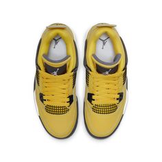 The Air Jordan 4 Retro GS 'Lightning' is back for the 2021 season. This sneaker was originally released in 2006 and was a popular choice among grade schoolers. The bright yellow nubuck upper with black molded eyelets and netting makes this sneaker stand out, as does the dark grey accents on the wings, interior tongue, and Jumpman logo. The white foam midsole provides comfort and support, while the visible Air-sole cushioning in the heel ensures a smooth ride. Jordan 4’s, Jordan Model, Air Jordan 13 Retro, Jordan 13 Retro, Dark Blue Grey, Air Jordan 11 Retro, Jordan 4 Retro, Jordan 11 Retro, Air Jordan 6