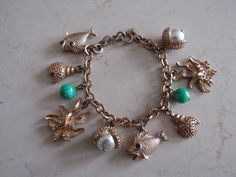 Pretty Sea Charms gold tone bracelet made by Sarah Coventry. In good vintage condition as shown. Measures 7 1/2". Sea Charms, Shabby Chic Jewelry, Sarah Coventry Jewelry, Vintage Charm Bracelet, Vintage Inspired Jewelry, Sarah Coventry, Chic Jewelry, Coventry, Charm Bracelets