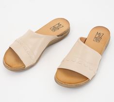 When a slide-in-and-go sandal is this posh (thank you, European leather), even your jeans-and-tee uniform feels like a chic style statement. From Miz Mooz. Beach Slip-on Mules With Leather Footbed, Outdoor Leather Slides With Non-slip Sole, Calf Leather Slip-on Mules With Removable Insole, Flat Mules With Branded Insole, Medium Width, Miz Mooz Sandals, Miz Mooz, Leather Slide Sandals, Leather Weaving, Leather Slides