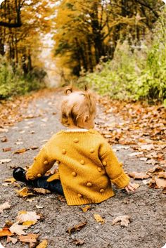 Your baby girl will be quite stylish and cozy this fall and winter in our oversized pom pom cardigan sweater. With a sweater this soft and cozy, you will want to snuggle with her all day. Pom pom detailing V-Neck Button front Processing Time: 10-15 business days before shipping. Cute Chunky Knit Sweater For Fall, Playful Knit Cardigan For Fall, Playful Knit Cardigan For Winter, Playful Winter Cardigan, Playful Winter Soft Knit Sweater, Playful Soft Knit Sweater For Fall, Playful Knitted Cardigan For Fall, Playful Knitted Fall Cardigan, Playful Knitted Sweater For Fall