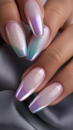 A mesmerizing and unique design inspired by the northern lights. All nails are painted in a soft translucent base, with the tips accented in an iridescent gradient shifting between shades of teal, lavender, and pink for a magical and futuristic look. Perfect for #IridescentNails, #GradientNailTips, #AuroraNailArt, #2025TrendyNails, and #UniqueNailDesigns. Elegant Nail, Elegant Nail Art, Edge Nails, Shades Of Teal, Gradient Nails, The Northern Lights, Types Of Nails, Beauty Trends, Trendy Nails