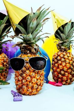 two pineapples wearing sunglasses with text overlay how to celebrate big career wins