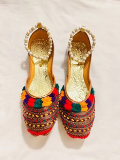 This is a traditional Afghani slipper (paissare) which can be worn during any event Summer Festive Slip-on Flats, Festive Summer Slip-on Flats, Traditional Handmade Slippers For Spring, Multicolor Slip-on Flats For Festival, Multicolor Party Flats, Closed Toe Flats For Summer Festivals, Closed Toe Flats For Festive Summer Occasions, Closed Toe Flats For Festive Summer Events, Traditional Multicolor Sandals For Spring