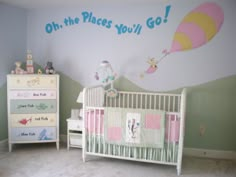 an image of a baby's room with a hot air balloon painted on the wall