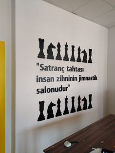 the wall is decorated with chess pieces