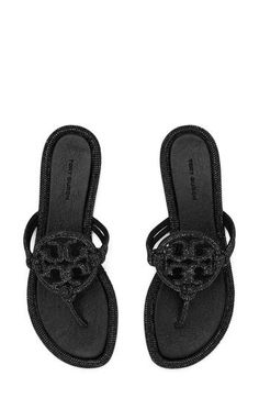 Tonal pavé crystals flood the slender straps and signature medallion of this glitzy sandal set on a slender, cushioned footbed. Flat sole Leather upper and lining/rubber sole Imported Tory Burch Sandals Black, Pretty Sandals, Tory Burch Sandals, Tory Burch Miller, Black Glitter, Sandal Women, Pink Christmas, Christmas List, Shoe Collection