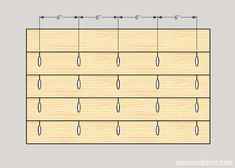 a diagram showing the length and width of a peg board with holes in each row