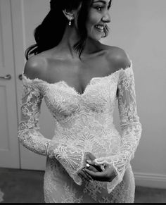 black and white photograph of woman in wedding dress