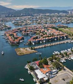 an aerial view of a marina with boats in the water