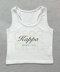 a white crop top that says kappa since 1970 on the front and back