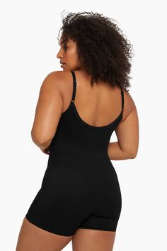 Elevate your workout wardrobe with the Sportbody® Scoop Shortysuit in Onyx. Inspired by our best-selling Scoop Bra, it features a wide neckline that scoops in the front and back, creating a body-hugging, contouring fit. With flattering seams along the back, waist, and rise, this shortysuit offers full support with high compression. Crafted from our proprietary Sportbody® fabric, it's the epitome of athletic style. Scoop Bra, Set Active, Workout Wardrobe, Athletic Style, Longline Bra, Layering Tanks, Sweetheart Dress, Racerback Bra, Athletic Fashion