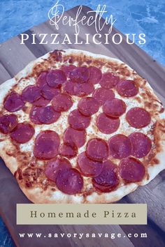 the homemade pizza is ready to be served on the table with water in the background