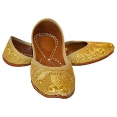 Vintage 1970s men’s gold leather Indian Punjabi jutti wedding shoes. Vintage hand stitched and hand tooled leather shoes with hand embroidered with gilt metallic threads. Amazing Mughal style gold embroidered traditional Islamic Indian leather shoes fit for a Maharaja. Arabic Persian Turkish Moorish Mughal Punjabi style Leather Shoes. Embroidered with excessive amounts of gold thread the slippers signify wealth, status and high fashion. Developed in the Mughal royal courts (1526–1857), this styl Luxury Traditional Sandals For Festive Season, Gold Leather Shoes With Almond Toe And Leather Sole, Gold Leather Shoes With Almond Toe, Traditional Leather Shoes With Round Toe For Formal Occasions, Traditional Round Toe Leather Shoes For Formal Occasions, Traditional Leather Shoes With Round Toe For Festivals, Traditional Leather Shoes For Festivals, Traditional Closed Toe Leather Shoes For Festivals, Arab Shoes