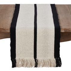 a black and white striped table runner