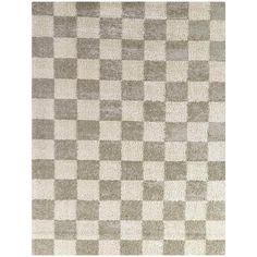 a checkered rug with grey and white colors