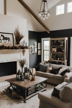 a living room filled with furniture and a fire place in the middle of a room