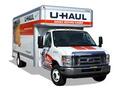 the u - haul moving truck is white and red