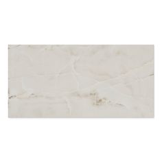 a white marble textured wallpaper with an irregular pattern on the top and bottom