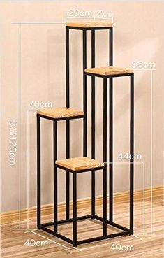 three metal and wood nesting tables with measurements for each side, including the top one