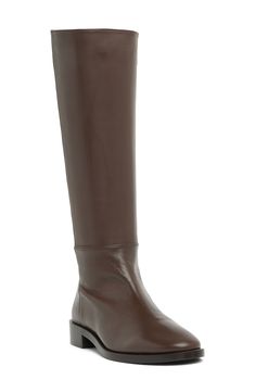 Complete your ensemble in style with this tall leather boot that easily pair with anything in your wardrobe. 15.25" shaft height, 12" opening circumference 1.25" heel Round toe Inner zip closure Leather upper/synthetic sole Made in Spain Leather Mid-calf High Shaft Boots For Work, Leather High Shaft Mid-calf Boots For Work, High Shaft Leather Boots For Fall, Brown Knee-high Boots With Round Toe For Business, High Shaft Calf Leather Boots For Fall, Tall Leather Boots For Work, Wide Calf Calf Leather Knee-high Boots For Office, Wide Calf Knee-high Boots In Calf Leather For Office, Leather Knee-high Boots With Leather Lining For Fall