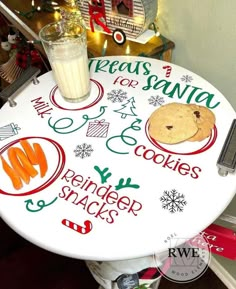 a christmas themed table with cookies and milk