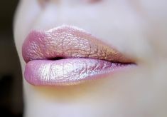 "US ORDERS $35 AND UP SHIP FREE WITH USPS STANDARD SHIPPING! \"Surya\" is a semi-sheer duochrome lipstick with pastel pink and golden tones. The shine depends on the way the light hits your lips when the lipstick is applied. Add a touch to your bottom lip for a natural, soft shimmer or apply a few layers to both lips for a deeper hue. This is a mica based lipstick, and is safe for lips, eyes, and skin, so have fun experimenting! PLEASE NOTE THAT DUE TO THE INTENSITY OF SHIMMER AND THE DUOCHROME Kiss Me At Midnight, Valentine Aesthetic, Makeup Cabinet, Shimmer Lipstick, Grow Gorgeous, Consumer Culture, Lip Balm Tubes, Natural Lipstick, Bottom Lip