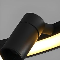 a close up of a light on a wall