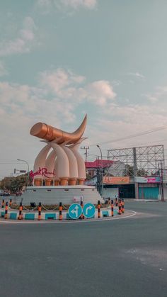 a large sculpture in the middle of a road