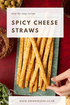 the recipe for spicy cheese straws is shown on a plate with dipping sauce and olives