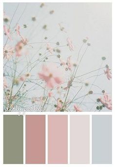 the color palette is pale, pink and grey with some white flowers in front of it