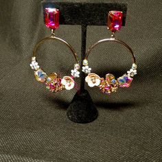 Never Worn Stunning Blooming Betsey Flower Hoop Pierced Earrings. They Measure 2 3/4" From Top To Bottom. They Are Beautifully Decorated With Crystals And Flowers. Metal Is Gold Tone. Glamorous Pink Jewelry For Celebration, Pink Metal Drop Flower Earrings, Rose Gold Metal Flower Earrings For Party, Gold Hoop Flower Earrings For Party, Party Flower Earrings In Rose Gold Metal, Pink Flower Metal Earrings, Pink Flower-shaped Metal Earrings, Glamorous Pink Earrings For Celebration, Spring Party Dangle Jewelry