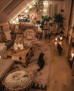 a living room filled with lots of furniture and candles on top of the tables in front of them