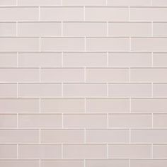 a white brick wall with no mortars on it