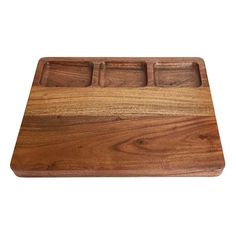 a wooden cutting board with three compartments