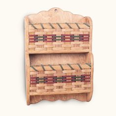 a wooden shelf with two baskets on it