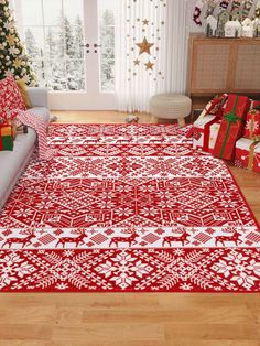 a living room decorated for christmas with presents on the floor