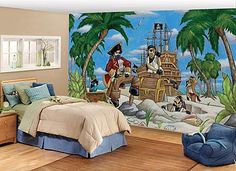 a bedroom with a pirate mural on the wall and a bed in front of it