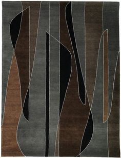 an area rug with various shapes and colors on the floor, including black, brown, grey